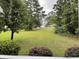 Expansive backyard with lush greenery, providing a serene outdoor space at 770 Charter Dr. # C4, Longs, SC 29568