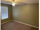 Standard bedroom with carpeted floor and a window allowing ample natural light at 770 Charter Dr. # C4, Longs, SC 29568