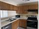 Kitchen with ample cabinet space, stainless steel appliances, and countertops at 770 Charter Dr. # C4, Longs, SC 29568