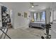 The bedroom has a ceiling fan, several windows and closet at 79 S Reindeer Rd., Surfside Beach, SC 29575