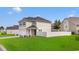 Charming exterior showcasing a two-story design, a two-car garage, and a well-maintained lawn at 79 S Reindeer Rd., Surfside Beach, SC 29575