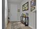 Welcoming foyer with stylish decor, console table, and attractive artwork at 79 S Reindeer Rd., Surfside Beach, SC 29575