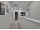 Second floor hallway featuring laundry closet and access to storage space at 79 S Reindeer Rd., Surfside Beach, SC 29575