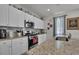 Well-equipped kitchen features stainless steel appliances, granite countertops, and ample storage space at 79 S Reindeer Rd., Surfside Beach, SC 29575