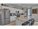 Modern kitchen featuring stainless steel appliances, granite countertops, and a stylish island with seating at 79 S Reindeer Rd., Surfside Beach, SC 29575