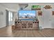 Bright living room featuring a media console, a large TV, and contemporary decor at 79 S Reindeer Rd., Surfside Beach, SC 29575