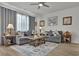 Comfortable living area features a sectional sofa, decorative pillows, and an attractive area rug at 79 S Reindeer Rd., Surfside Beach, SC 29575