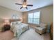 Comfortable bedroom featuring a ceiling fan, natural light, and cozy decor at 82 Mingo Dr. # 2D, Pawleys Island, SC 29585