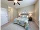 Serene bedroom with neutral colors, ceiling fan, and ample space at 82 Mingo Dr. # 2D, Pawleys Island, SC 29585