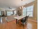 Open-concept living space featuring hardwood floors, natural light, and a seamless transition to the dining area at 82 Mingo Dr. # 2D, Pawleys Island, SC 29585