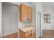Additional view of the kitchen featuring wooden cabinets and tiled floors at 821 Laquinta Loop, Murrells Inlet, SC 29576