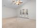 Large living room with vaulted ceiling and french doors at 821 Laquinta Loop, Murrells Inlet, SC 29576