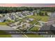 An aerial view of a residential community featuring a community pool, cabana, and well-manicured landscaping at 832 Windsor Rose Dr., Conway, SC 29526