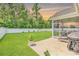 Spacious backyard with a covered patio, perfect for outdoor entertaining and relaxation at 832 Windsor Rose Dr., Conway, SC 29526
