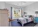 Bright bedroom features a large window and neutral decor at 832 Windsor Rose Dr., Conway, SC 29526