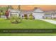 Charming single-story home with a well-manicured lawn and a neatly arranged garden at 832 Windsor Rose Dr., Conway, SC 29526