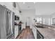 Bright kitchen featuring sleek stainless steel appliances and stone countertops at 832 Windsor Rose Dr., Conway, SC 29526