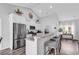 Modern kitchen with stainless appliances, granite counters, and breakfast bar seating at 832 Windsor Rose Dr., Conway, SC 29526