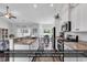 Bright kitchen with white cabinets, granite countertops, and stainless steel appliances at 832 Windsor Rose Dr., Conway, SC 29526