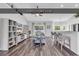 Bright living room with an open floorplan with grey vinyl flooring and a modern design at 832 Windsor Rose Dr., Conway, SC 29526