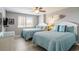 Bright bedroom with two beds and coastal decor at 8560 Queensway Blvd. # 106, Myrtle Beach, SC 29572