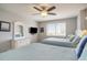 Comfortable bedroom with light-colored walls and two beds at 8560 Queensway Blvd. # 106, Myrtle Beach, SC 29572