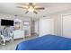 Comfortable bedroom with light-colored walls and carpet at 8560 Queensway Blvd. # 106, Myrtle Beach, SC 29572