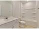 Bathroom featuring a toilet and a single sink vanity, offers convenience at 863 Long Beach Dr, Longs, SC 29568