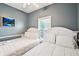 Bright bedroom features two comfortable beds and a window at 931 S Ocean Blvd., North Myrtle Beach, SC 29582