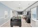 Large game room with sofa, foosball table, arcade game and TV at 931 S Ocean Blvd., North Myrtle Beach, SC 29582