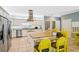 Spacious kitchen with granite countertops, stainless steel appliances, and an island with seating at 931 S Ocean Blvd., North Myrtle Beach, SC 29582
