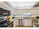 Modern kitchen with stainless steel appliances, granite countertops, and lots of cabinet space at 931 S Ocean Blvd., North Myrtle Beach, SC 29582