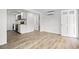 Open-concept living space with light wood floors and modern appliances at 1004 Georgetown St., Marion, SC 29571