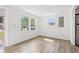 Bright living room with sleek flooring and ample natural light from large windows at 1004 Georgetown St., Marion, SC 29571