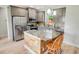 Modern kitchen with stainless steel appliances, stylish cabinetry, granite countertops, and a kitchen island at 1013 Happy Ln., Galivants Ferry, SC 29544