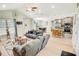 Bright and open living space with hardwood floors, comfortable furniture, and an adjoining kitchen and dining area at 1013 Happy Ln., Galivants Ferry, SC 29544