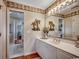 Elegant bathroom featuring a spacious vanity, bright lighting and unique decor at 1017 Coral Reef Dr., North Myrtle Beach, SC 29582
