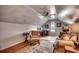 Versatile bonus room with a ceiling fan, sloped ceiling, and ample space for living and relaxing at 1017 Coral Reef Dr., North Myrtle Beach, SC 29582