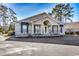Commercial building with white brick and awnings at 1017 Coral Reef Dr., North Myrtle Beach, SC 29582