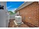 Home exterior featuring a brick wall and a backup generator at 1017 Coral Reef Dr., North Myrtle Beach, SC 29582