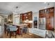 Spacious kitchen featuring a granite countertop island and stainless-steel appliances at 1017 Coral Reef Dr., North Myrtle Beach, SC 29582