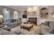 Inviting living room with a fireplace, built-in shelving, and comfortable seating at 1017 Coral Reef Dr., North Myrtle Beach, SC 29582