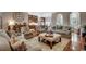 Spacious living room boasts plush seating, an open layout, and a view of the kitchen at 1017 Coral Reef Dr., North Myrtle Beach, SC 29582
