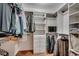Spacious walk-in closet with built-in shelves and drawers for organization and storage at 1017 Coral Reef Dr., North Myrtle Beach, SC 29582