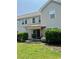 View of the backyard featuring patio with furniture and sliding glass doors at 1048 Fairway Ln. # 1048, Conway, SC 29526