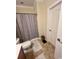 Full bathroom with ceramic tile, shower with curtains, and neutral decor at 1048 Fairway Ln. # 1048, Conway, SC 29526