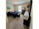 Bedroom with carpet flooring, window with blinds, and tv at 1048 Fairway Ln. # 1048, Conway, SC 29526
