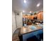 Kitchen with granite countertops, stainless steel appliances, and wood cabinets at 1048 Fairway Ln. # 1048, Conway, SC 29526