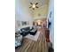 Large living room featuring vaulted ceiling, hardwood floors, and plenty of seating at 1048 Fairway Ln. # 1048, Conway, SC 29526