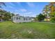 Charming single-story home with a well-maintained yard, showcasing its inviting exterior and serene surroundings at 109 Plum Ln., Andrews, SC 29510